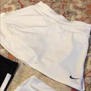 3 Medium Nike Tennis Skirts, 2 white and one black